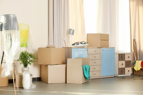Removal team preparing boxes during a Maida Vale move
