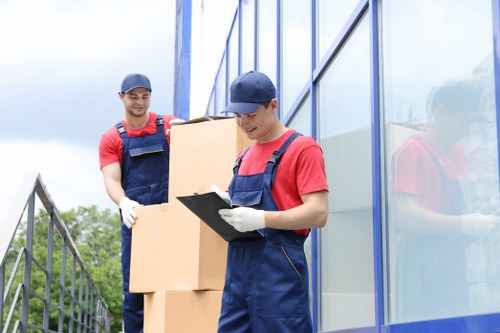 Moving crew handling payment and invoice paperwork