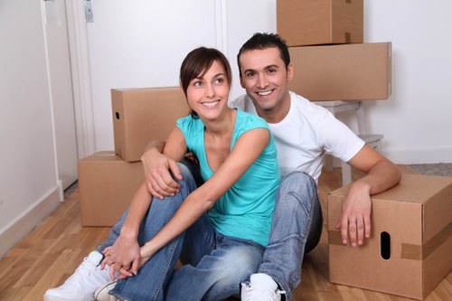 Removal company team maintaining safe, tidy working practices