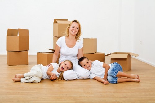 Household storage in Maidavale with neatly packed boxes and furniture